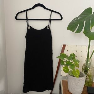 Never worn black urban outfitters mini dress. Lined inside.